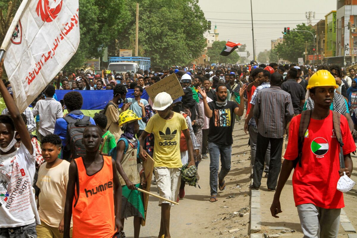 People march during a demonstration against military rule in the Bashdar area of el-Diam district of Sudan's capital Khartoum on June 16, 202 [AFP via Getty Images]