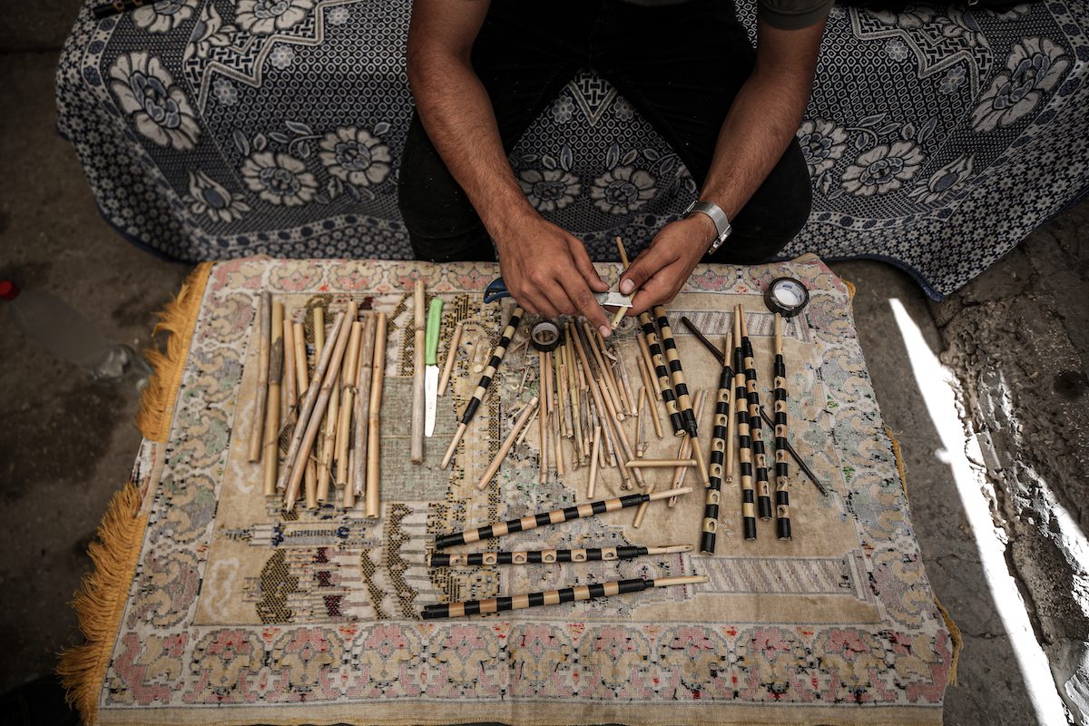 Palestinian youth resist poverty by selling handcrafted musical ...