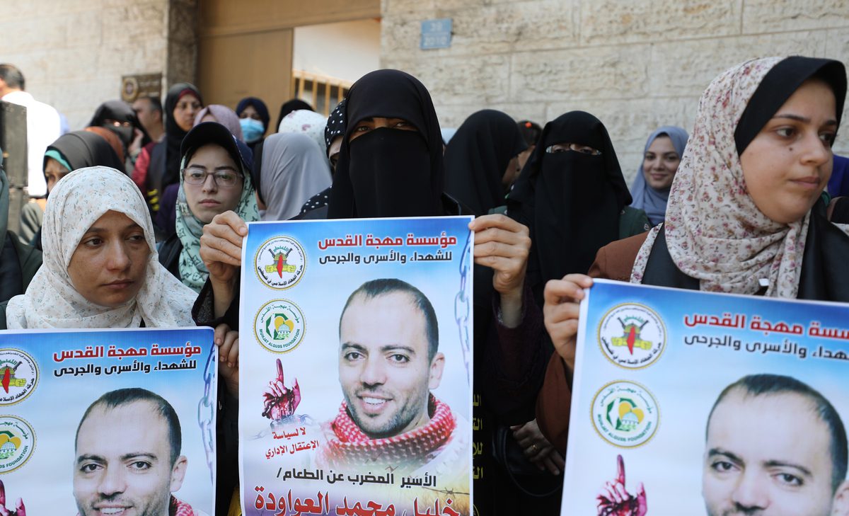 A protest in solidarity with Khalil Awawdeh, a Palestinian prisoner who is on hunger strike on 1 August 2022 [Mahmoud Nasser/ApaImages]