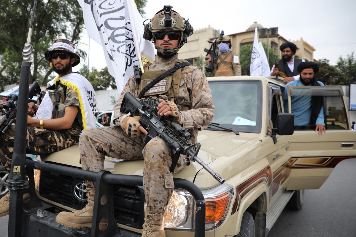 Taliban members held a convoy to celebrate Taliban's first anniversary of taking over the government, in the capital Kabul, Afghanistan on August 15, 2022 [Haroon Sabawoon/Anadolu Agency]