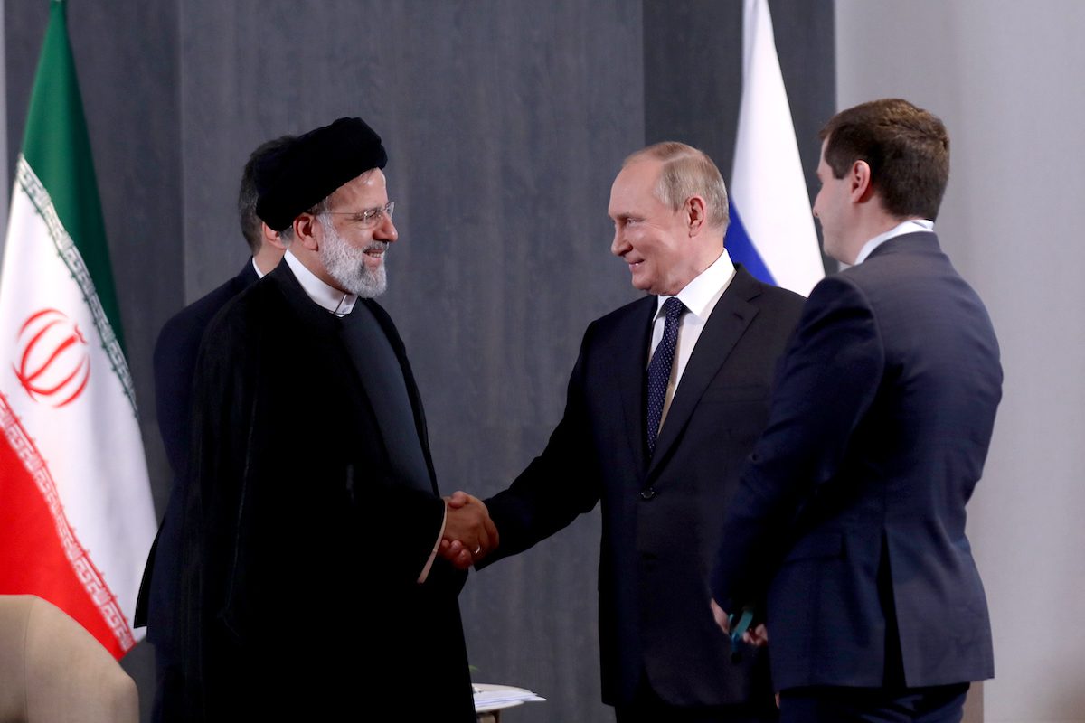 Russian President Vladimir Putin (R) meets with Iranian President Ebrahim Reisi (L) within the Shanghai Cooperation Organization (SCO) Summit in Samarkand, Uzbekistan on September 15, 2022. [Iranian Presidency / Handout - Anadolu Agency]