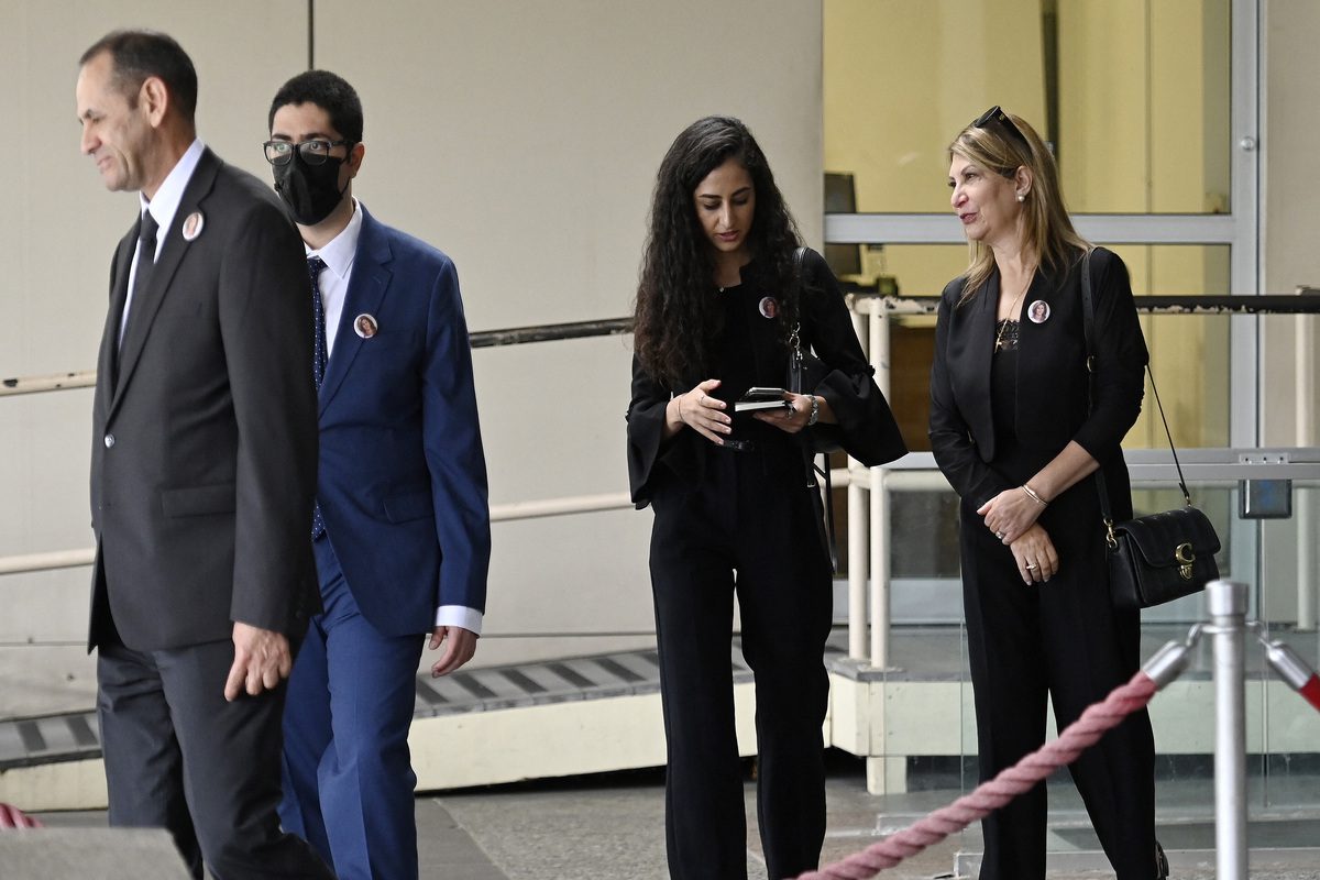 The family of Palestinian-American journalist Shireen Abu Akleh, including her brother Tony Abu Akleh (L), her niece Lina Abu Akleh (C), and nephew Victor Abu Akleh (2L), stands outside the State Department in Washington, DC, on July 26, 2022 [OLIVIER DOULIERY / AFP]