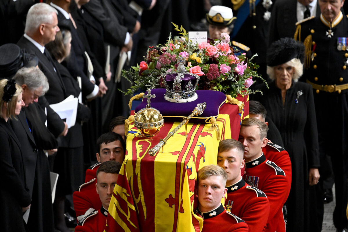 Anne, Princess Royal, and Camilla, Queen Consort walk alongside the coffin carrying Queen Elizabeth II with the Imperial State Crown resting on top as it departs Westminster Abbey during the State Funeral of Queen Elizabeth II on September 19, 2022 in London, England [Gareth Cattermole/Getty Images]