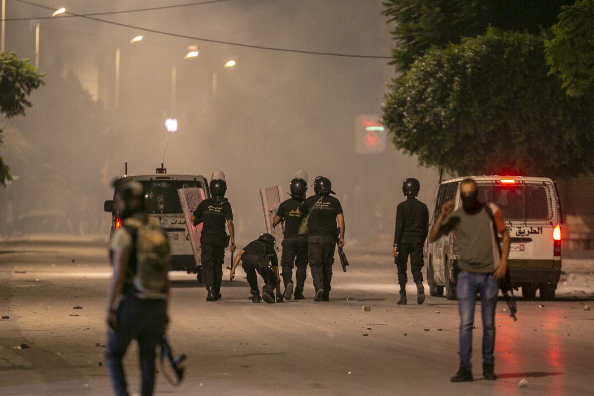 Protesters clash with police as they gather to protest the death of 17-year-old young man at hospital in Tunis, Tunisia on October 15, 2022. [Yassine Gaidi - Anadolu Agency]