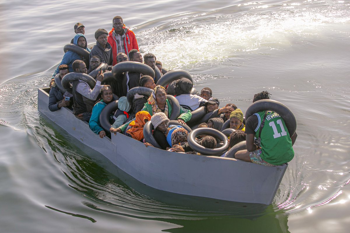 Irregular migrants are seen with Tunisian National Guard off the city of Sfax in the south of Tunisia on October 28, 2022 [Yassine Gaidi/Anadolu Agency]