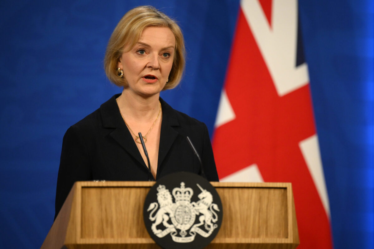 UK Prime Minister Liz Truss talks at a press conference in 10 Downing Street on October 14, 2022 in London, England [Daniel Leal/WPA Pool/Getty Images]