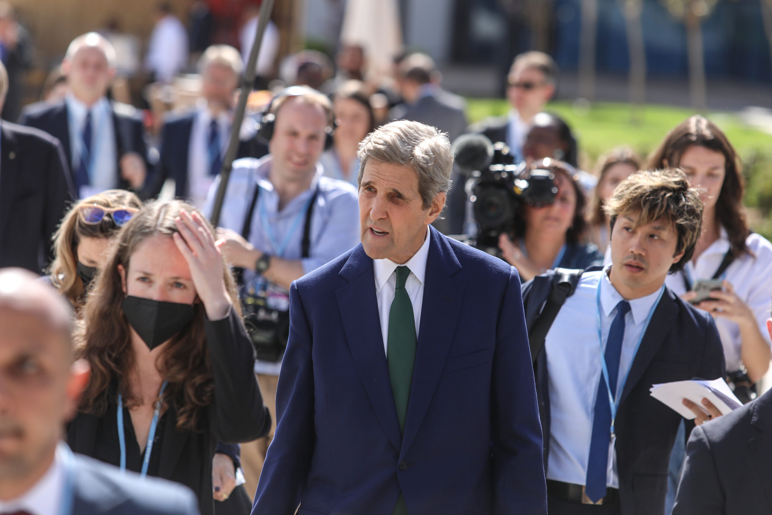 United States Special Presidential Envoy for Climate John Kerry (C) is being welcomed by officials upon his arrival to attend the 2022 United Nations Climate Change Conference (COP27) on November 08, 2022 [Mohamed Abdel Hamid/Anadolu Agency]