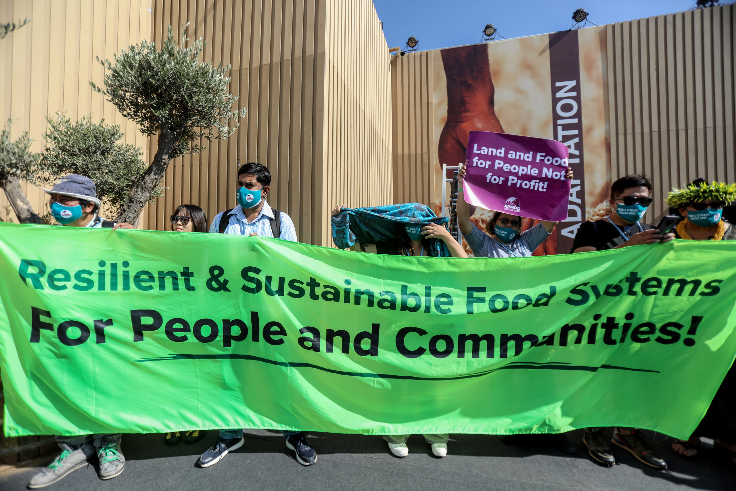 Environmental activists gather in front of the International Convention Center on the 27th Conference of the Parties to the United Nations Framework Convention on Climate Change (COP27) in Sharm El Sheikh, Egypt on November 14, 2022 [Mohamed Abdel Hamid/Anadolu Agency]
