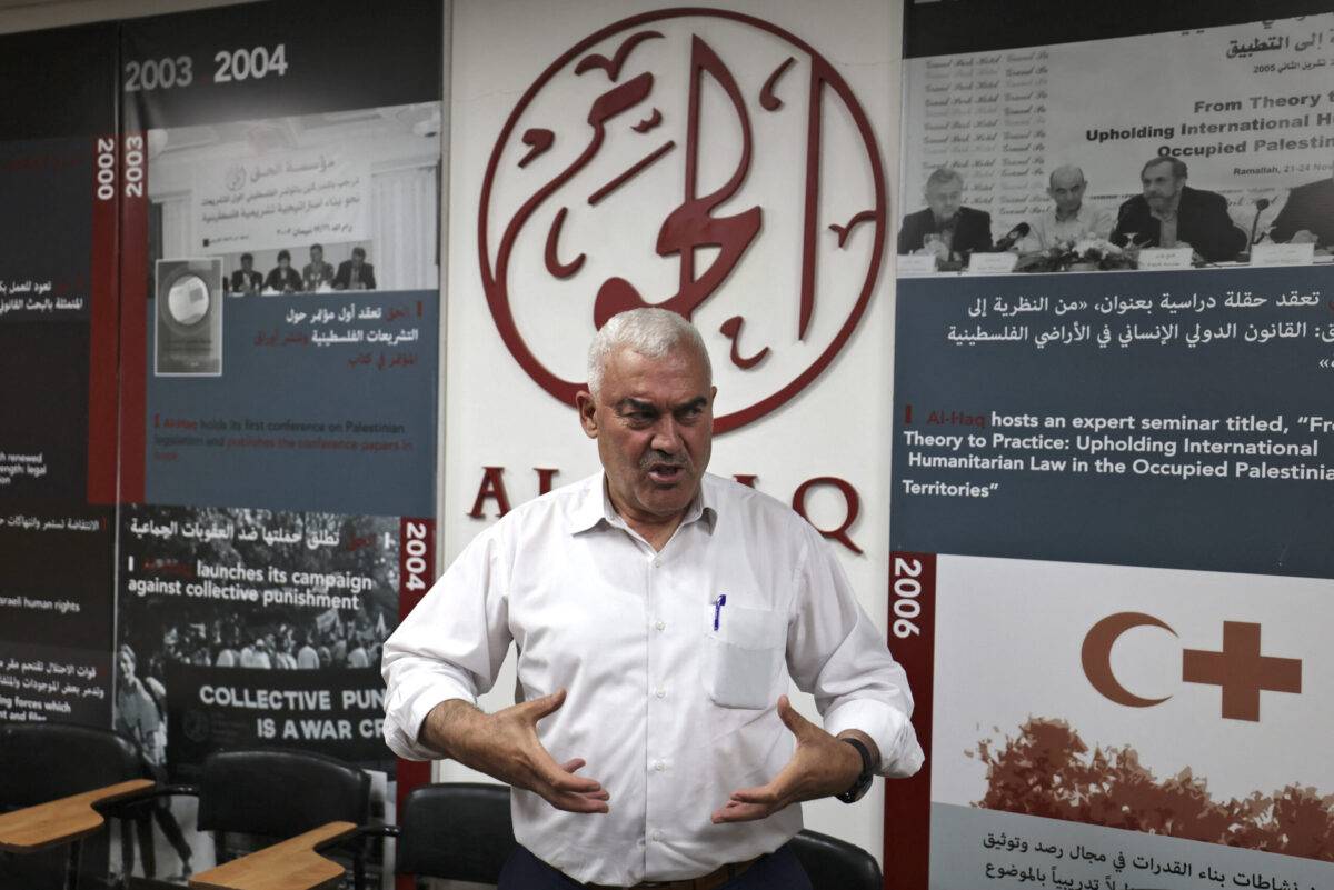 Shawan Jabarin, the director of Palestinian human rights group Al-Haq, gestures as he speaks at the organisation's offices, days after it was raided by Israeli forces, in the West Bank city of Ramallah, on August 24, 2022 [ABBAS MOMANI/AFP via Getty Images]