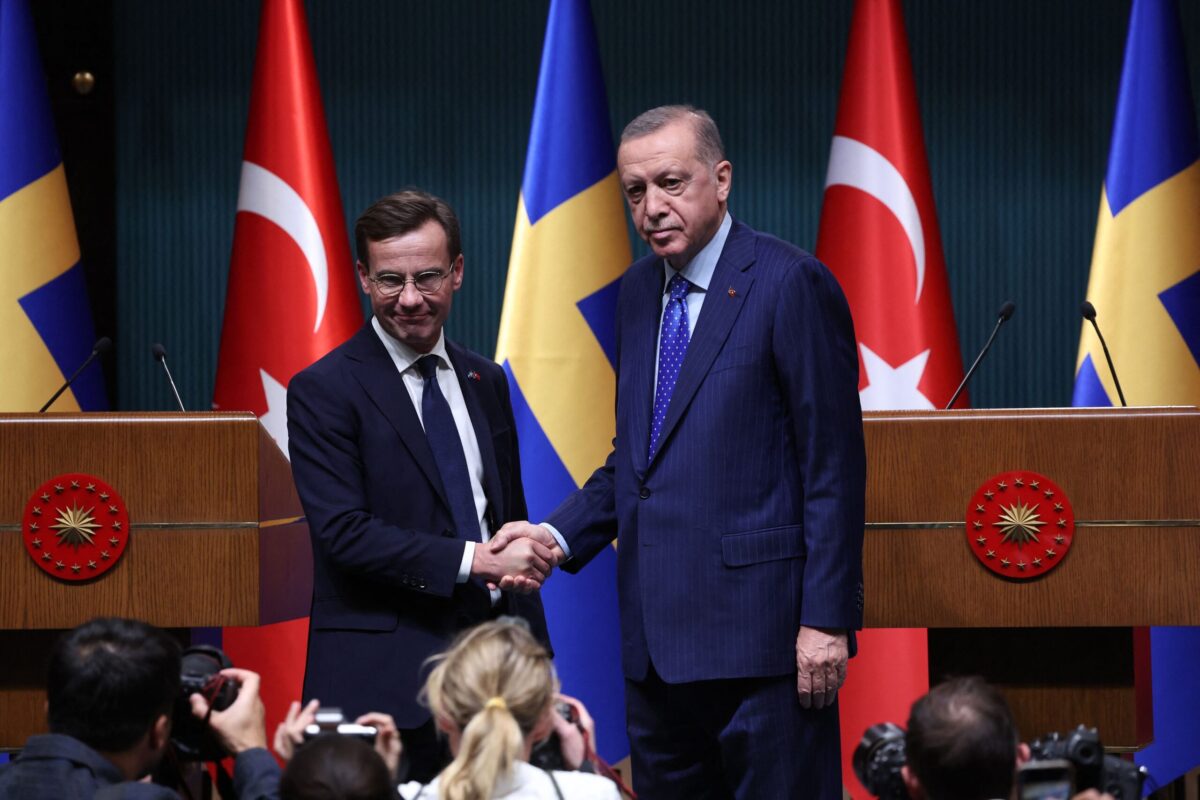 Turkish President Recep Tayyip Erdogan (R) shakes hand with Swedish Prime Minister Ulf Kristersson (L) during a press conference following their meeting at the Presidential Palace in Ankara [ADEM ALTAN/AFP via Getty Images]
