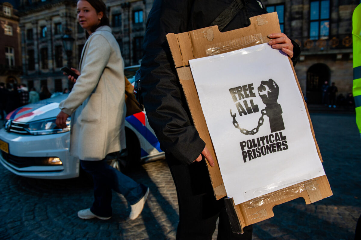 People protest against greenwashing the human rights crisis during the COP27 in Egypt on 13 November, 2022 [Romy Arroyo Fernandez/NurPhoto via Getty Images]