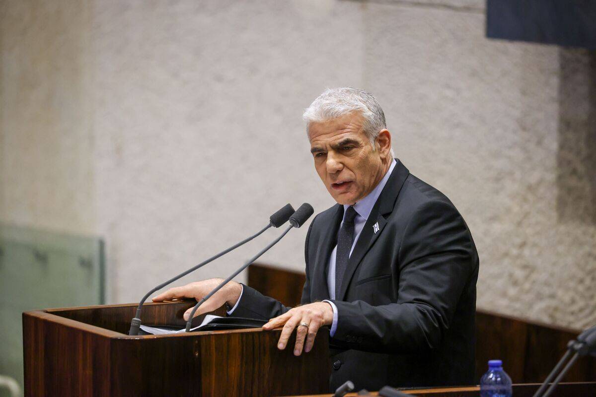 Outgoing Israeli Prime Minister Yair Lapid speaks during the session to elect Israel's new Speaker of the Parliament at the Knesset in Jerusalem, on December 13, 2022 [Israeli Parliament (Knesset)/Anadolu Agency]