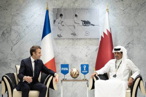French President Emmanuel Macron (L) meets with Emir of Qatar Sheikh Tamim bin Hamad Al-Thani (R). [Amiri Diwan of the State of Qatar - Anadolu Agency]