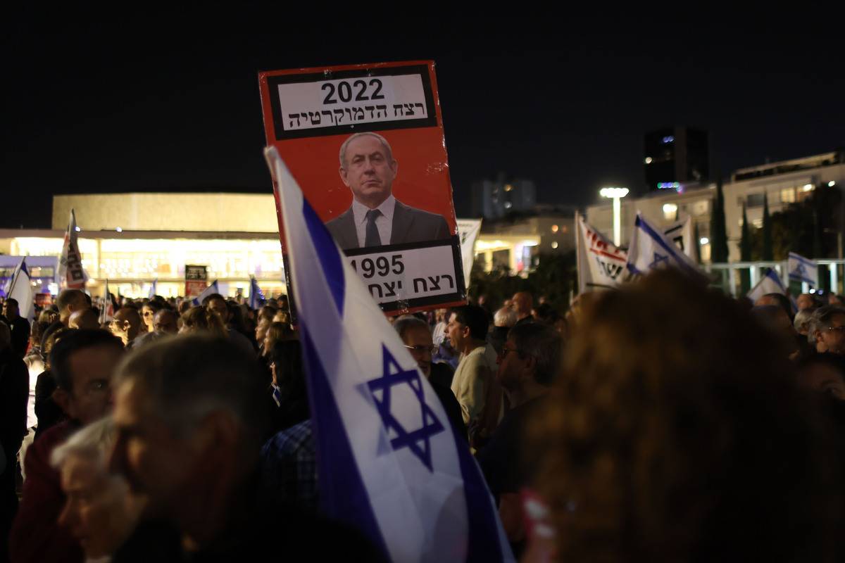 People gather to protest against the far-right upcoming coalition government led by prime minister-designate and Likud Party's Chairman Benjamin Netanyahu in Tel Aviv, Israel on December 17, 2022 [Mostafa Alkharouf/Anadolu Agency]