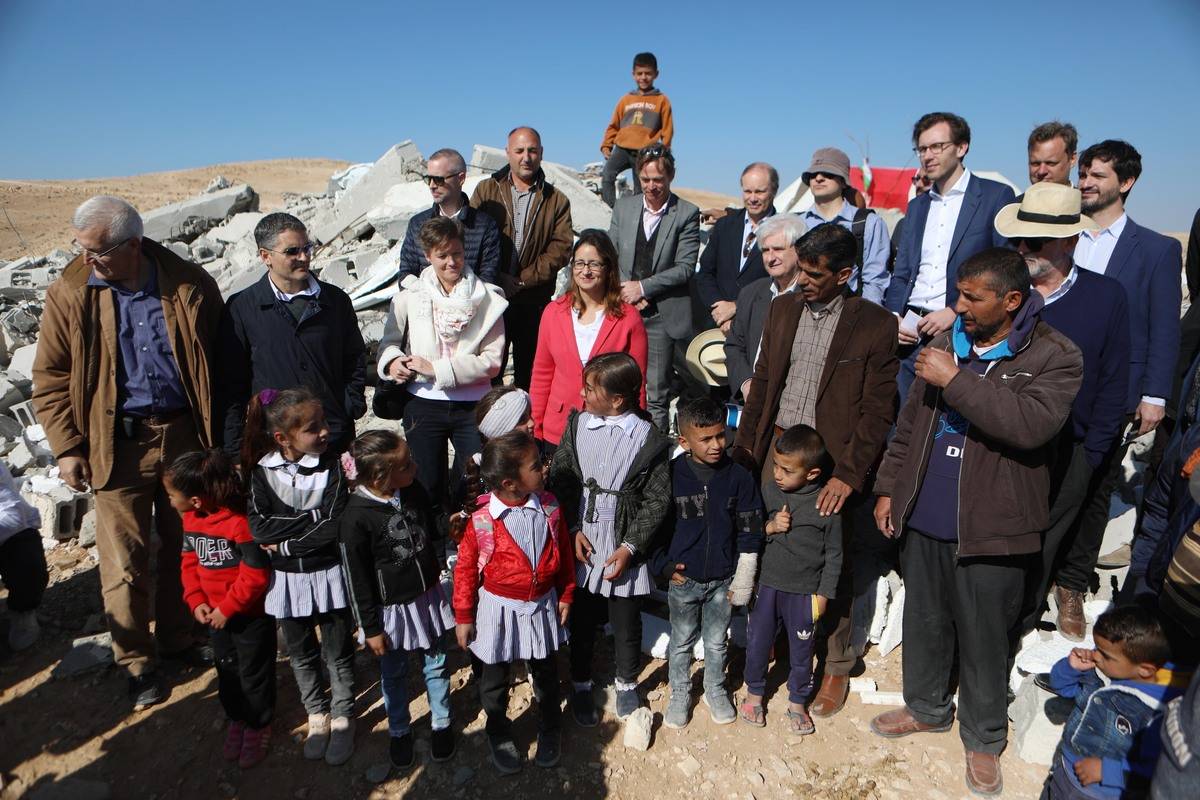 European diplomats visit the village where the school was destroyed by Israeli forces about a month ago in the Masafer Yatta district of Hebron of the West Bank on December 19, 2022 [Mamoun Wazwaz/Anadolu Agency]