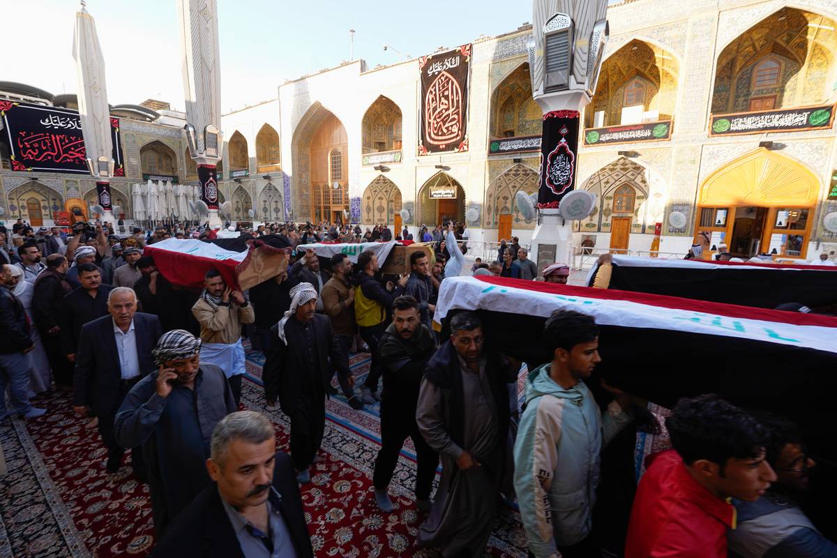 People attend the funeral ceremony of 8 people who died in the armed attack carried out by the terrorist organization Daesh in the village of Albu Bali in Diyala province of Iraq in Najaf, Iraq