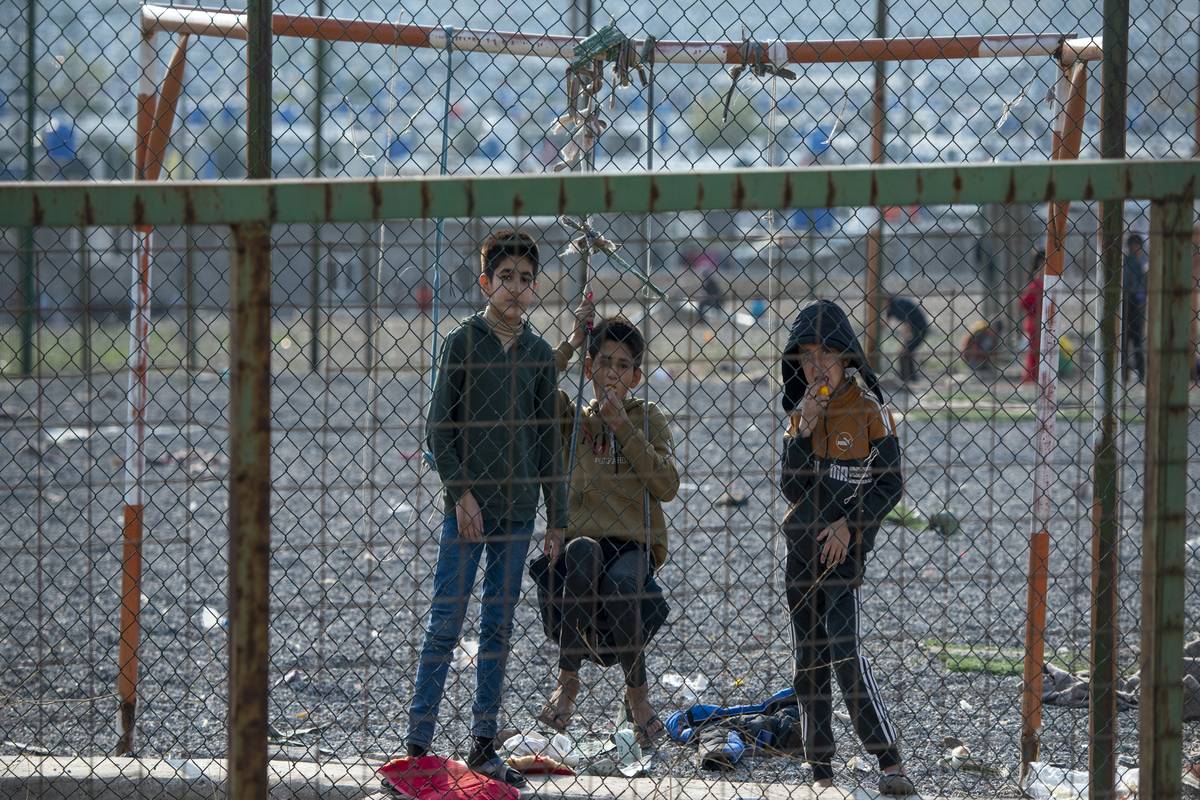 Syrian refugee kids are seen in Kawergosk Refugee Camp as refugees wait for the aid of international organizations in Erbil, Iraq on December 22, 2022. [Ahsan Mohammed Ahmed Ahmed - Anadolu Agency]
