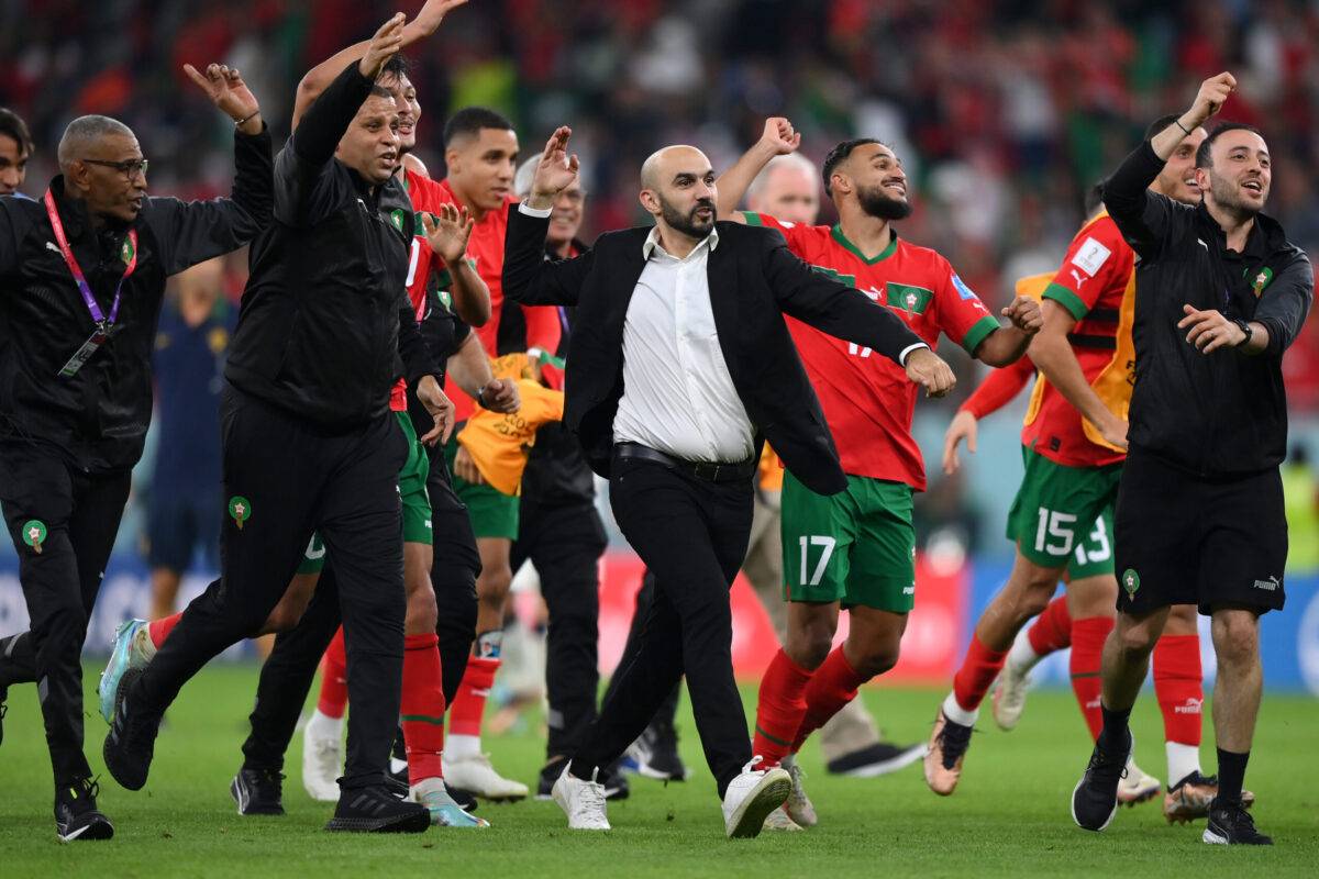 Walid Regragui, Head Coach of Morocco, celebrates with their team after the team's victory during the FIFA World Cup Qatar 2022 on December 10, 2022 in Doha, Qatar [Justin Setterfield/Getty Images]