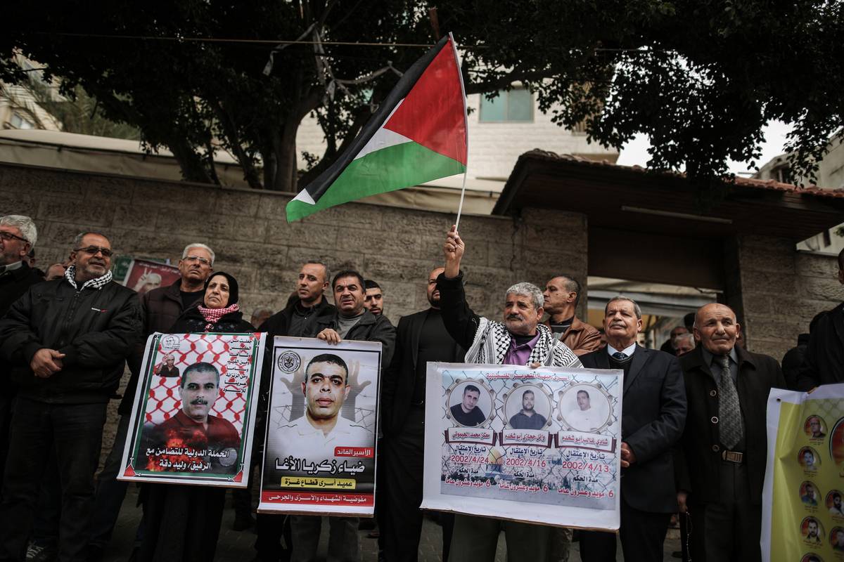 People stage a demonstration, for supporting Palestinian prisoners in Israeli jails, Gaza City, Gaza on January 16, 2023. [Ali Jadallah - Anadolu Agency]