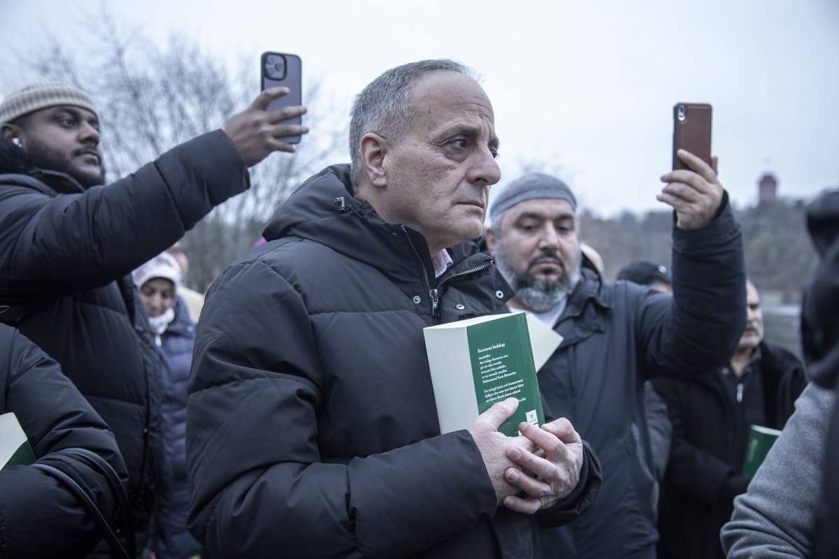 People stage a protest against the burning of the Quran in front of Swedish Embassy in Stockholm, Sweden on January 24, 2023 [Narciso Contreras/Anadolu Agency]