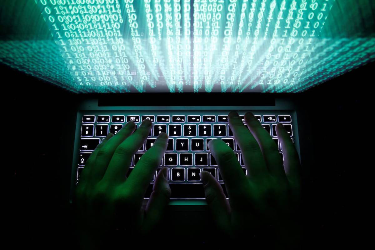 Illustration file picture shows a man typing on a computer keyboard. [REUTERS/Kacper Pempel]