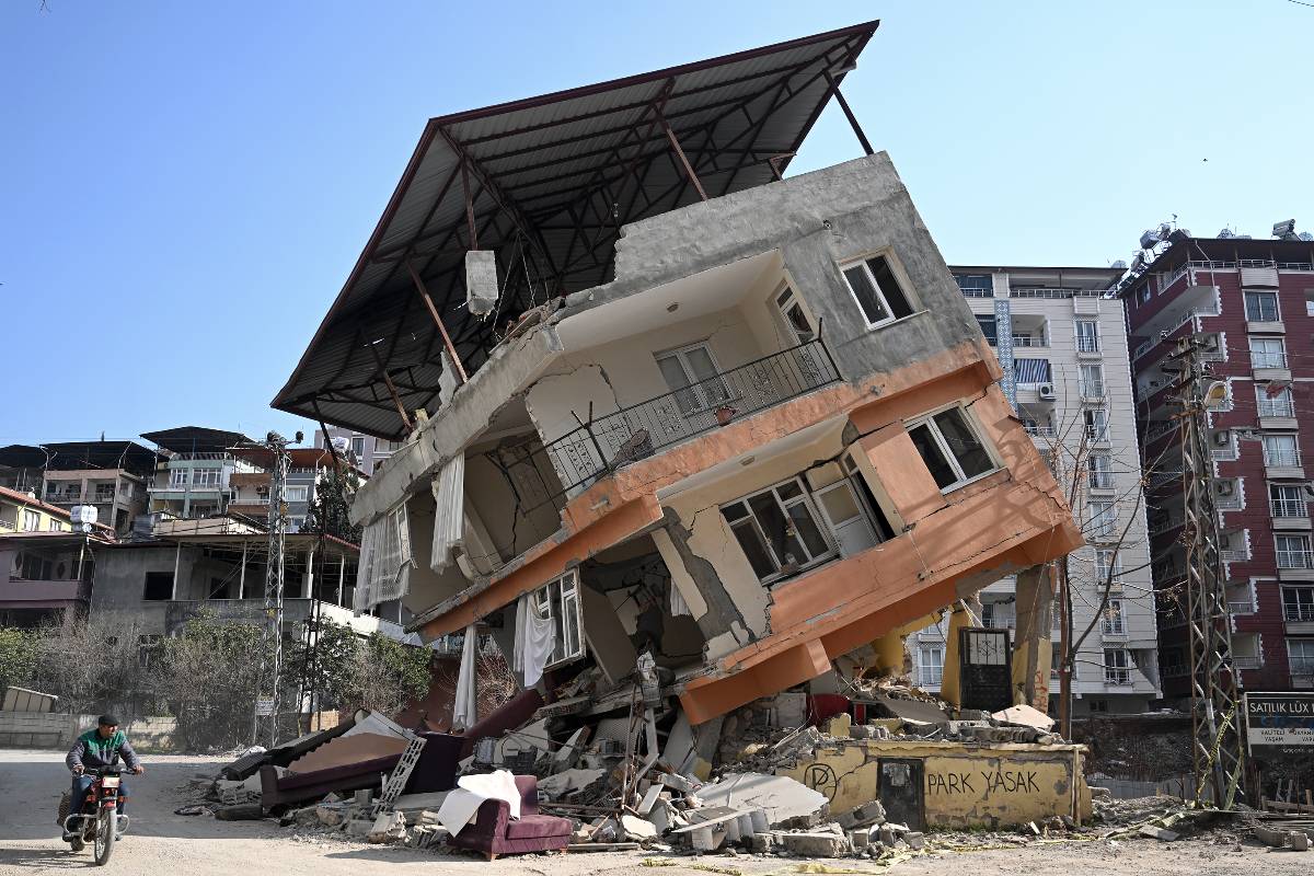 A view of collapsed building after earthquakes hit multiple provinces of Turkiye [Mahmut Serdar Alakuş/Anadolu Agency]