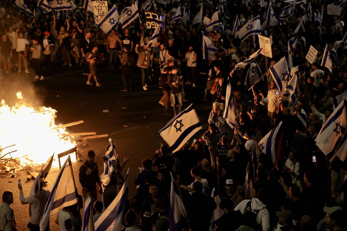 Thousands of Israelis take the streets in response to Prime Minister Benjamin Netanyahu’s surprise sacking of his defense minister Yoav Gallant in Tel Aviv, Israel on March 26, 2023 [Mostafa Alkharouf - Anadolu Agency]