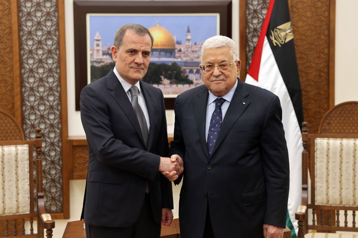 Palestinian President Mahmoud Abbas (R) shake hands with the Azerbaijani Foreign Minister Jeyhun Bayramov (L) in Ramallah, West Bank on March 30, 2023. [Palestinian Presidency - Anadolu Agency]