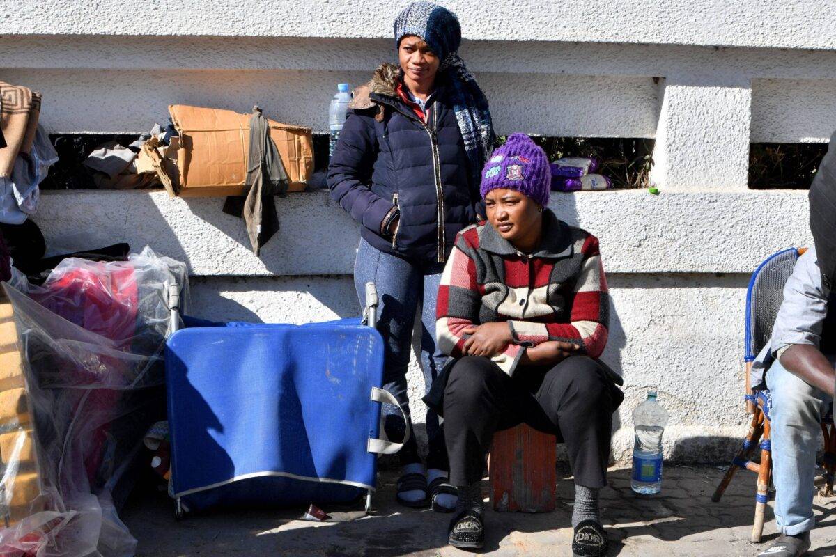 Sub-Saharan African migrants camp outside the headquarters of the International Organisation for Migration (IOM) in Tunis, on March 2, 2023 [FETHI BELAID/AFP via Getty Images]