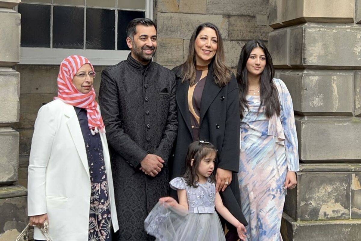 Newly elected leader of the Scottish National Party Humza Yousaf (2nd L) poses with his family, including his wife Nadia El-Nakla (2nd R) as he arrives to sworn in as Scotland's First Minister at the Scottish High Court in Edinburgh, Scotland on March 29, 2023. [Oguz Kagan Meydan/Anadolu Agency via Getty Images]