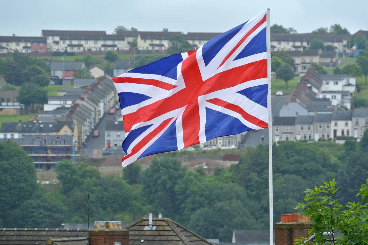 Union Flag Seen From City Walls, in United Kingdom [Photo by Derry via Getty Images]