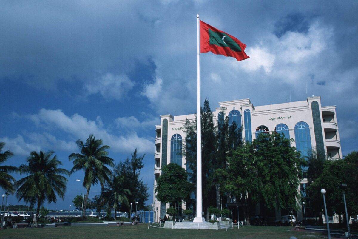 The national flag in front of the police headquarters in Male, the capital of the Maldives [Gerhard Joren/LightRocket via Getty Images]