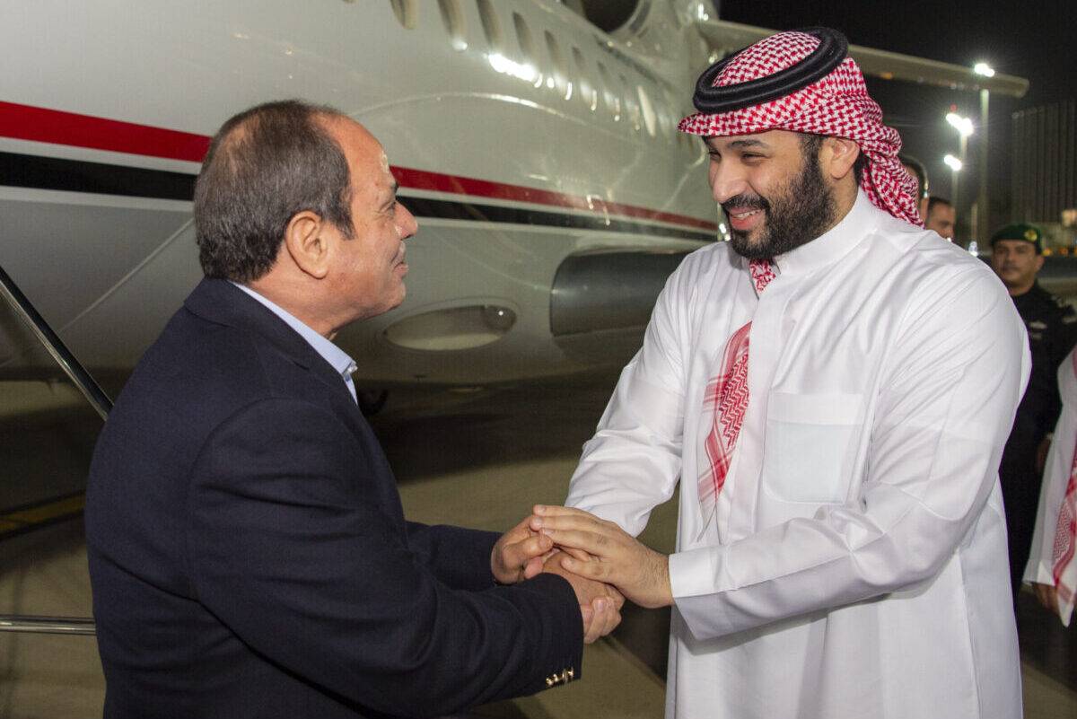 Egyptian President Abdel Fattah El-Sisi (L) being welcomed by Saudi Arabian Crown Prince Mohammed bin Salman (R) at King Abdulaziz International Airport in Jeddah, Saudi Arabia on April 02, 2023. [Royal Court of Saudi Arabia - Anadolu Agency]