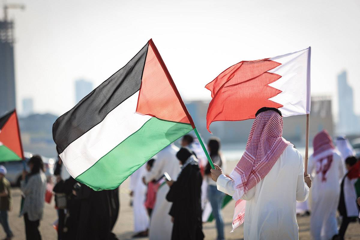 People stage a protest against Israeli raids on Al-Aqsa Mosque in Muharraq, Bahrain on April 08, 2023. [Ayman Yaqoob - Anadolu Agency]