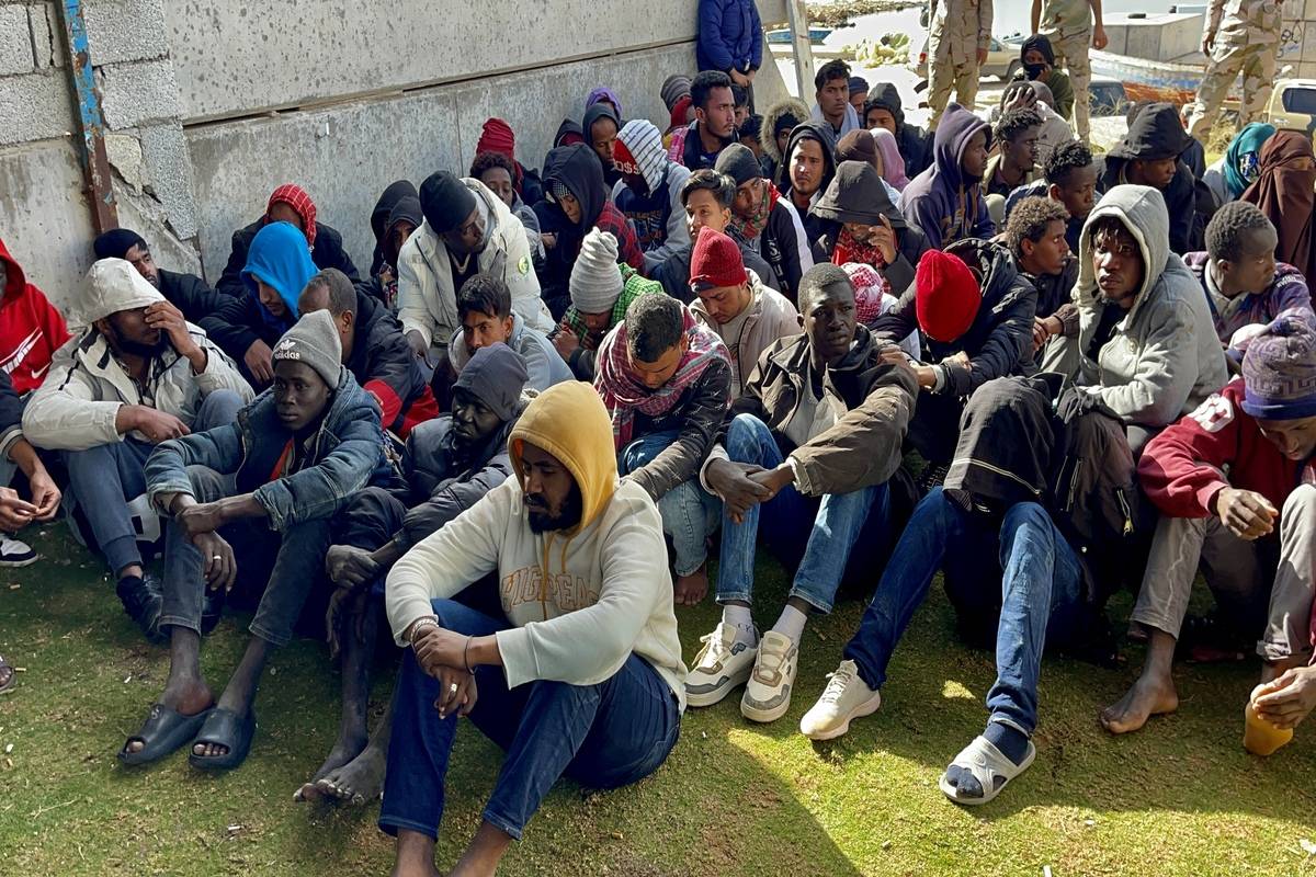 Migrants are seen after 11 people died as a result of the sinking of a boat carrying illegal immigrants off the coast of Garabulli, 60 kilometers east of Libya's capital Tripoli, on April 25, 2023 [Hazem Turkia - Anadolu Agency]