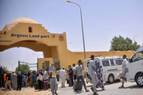 Citizens are seen upon their arrival in Egypt's Argeen Land port border crossing gate following their evacuation process from Sudan, due to clashes between the Sudanese army and paramilitary Rapid Support Forces (RSF) since April 15th, in Asvan, Egypt on April 27, 2023. [Adam Abdulfttah - Anadolu Agency]