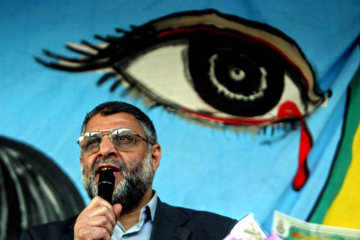 Newly-declared Hamas leader Dr. Abdel Aziz Rantisi speaks to female supporters, during his visit to the family house of former Hamas spiritual leader Sheikh Ahmed Yassin on March 24, 2004 in Gaza City, Gaza strip. Rantissi was injured in an Israeli helicopter attack on April 17, 2004 and later died of his wounds in hospital, according to hospital officials [Photo by Abid Katib/Getty Images]