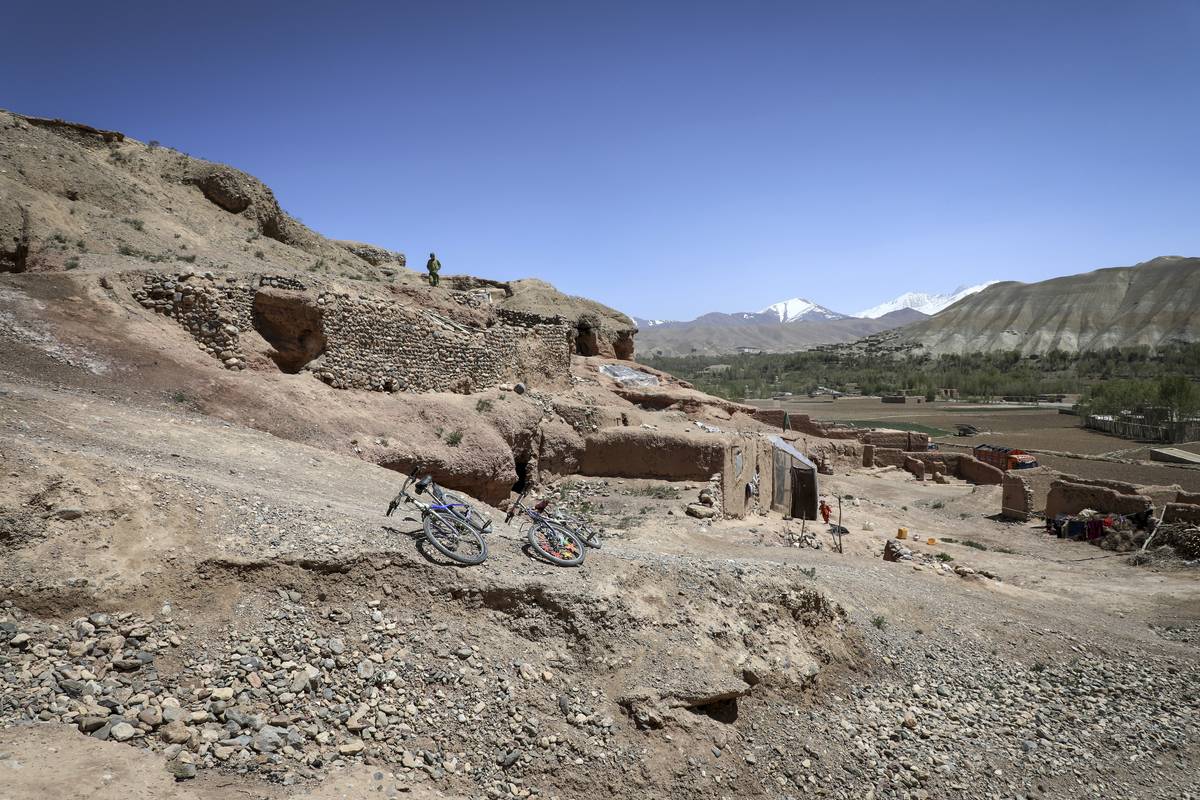 A general view of the caves inhabited by Afghan families, while many people struggle with drought, hunger, disease and malnutrition in Bamyan Province, Afghanistan on May 8, 2023 [Sayed Khodaiberdi Sadat - Anadolu Agency]