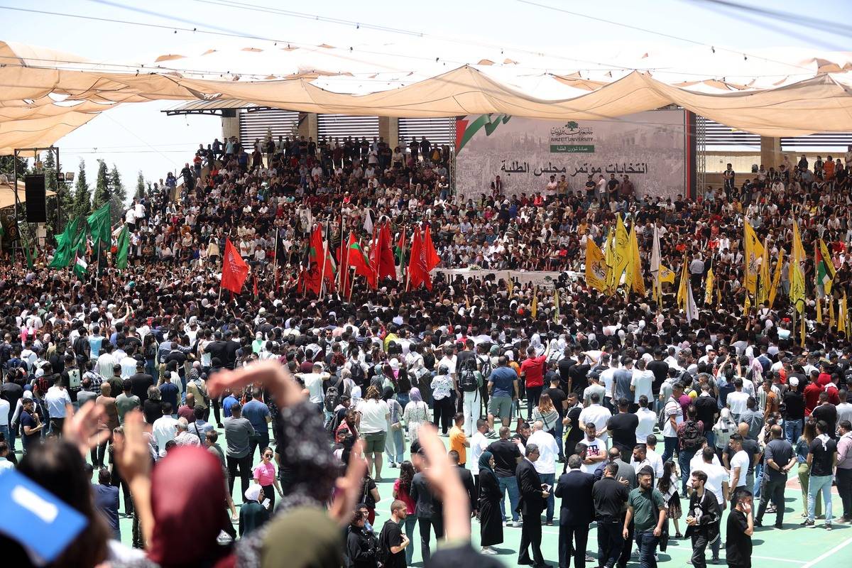 Students of Birzeit University, supporting Hamas, Fatah and the Popular Front for the Liberation of Palestine (DFLP), gather for a debate held prior to the Student Council Elections, in Ramallah, West Bank on May 23, 2023. [Issam Rimawi - Anadolu Agency]