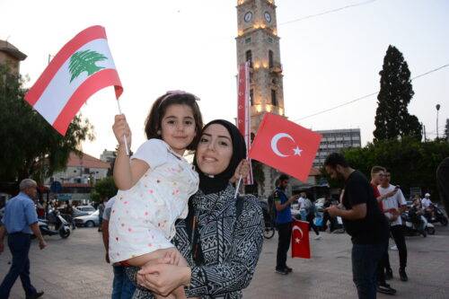 Supporters of Turkish President Recep Tayyip Erdogan gather to celebrate as Erdogan leads Turkiye's presidential runoff election in Tripoli, Lebanon on May 28, 2023. [Ahmad Said - Anadolu Agency]