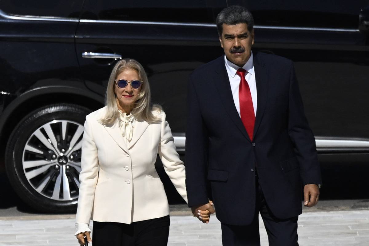 Venezuela's President Nicolas Maduro and his wife Cilia Flores arrive at Planalto Palace, in Brasilia, Brazil, May 29, 2023 [Mateus Bonomi/Anadolu Agency]