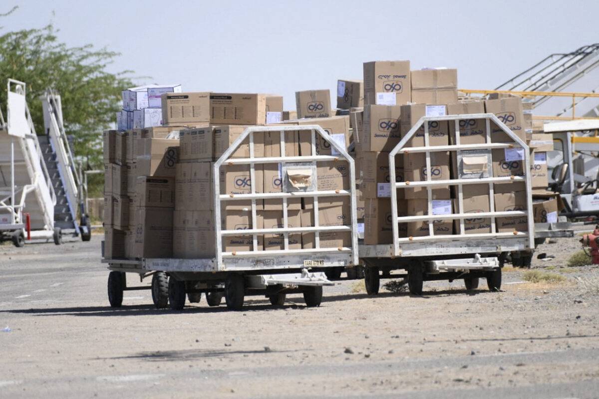 An aid cargo is offloaded from a plane which arrived earlier in Port Sudan, on May 5, 2023 [AFP via Getty Images]