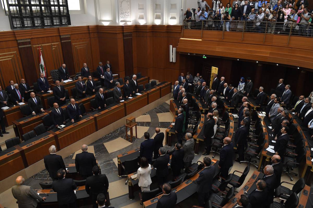 Lebanese parliament members stand up before the Lebanese parliament holds the 12th session to elect the 14th president in Beirut, Lebanon on June 14, 2023. [Hussam Shbaro - Anadolu Agency]