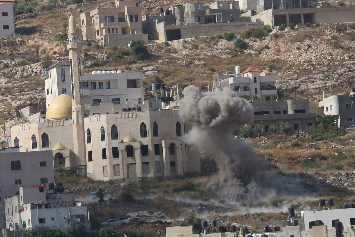 Smoke rises after Israeli forces' aerial bombardment attack on the city of Jenin, West Bank on June 19, 2023 [Nedal Eshtayah - Anadolu Agency]