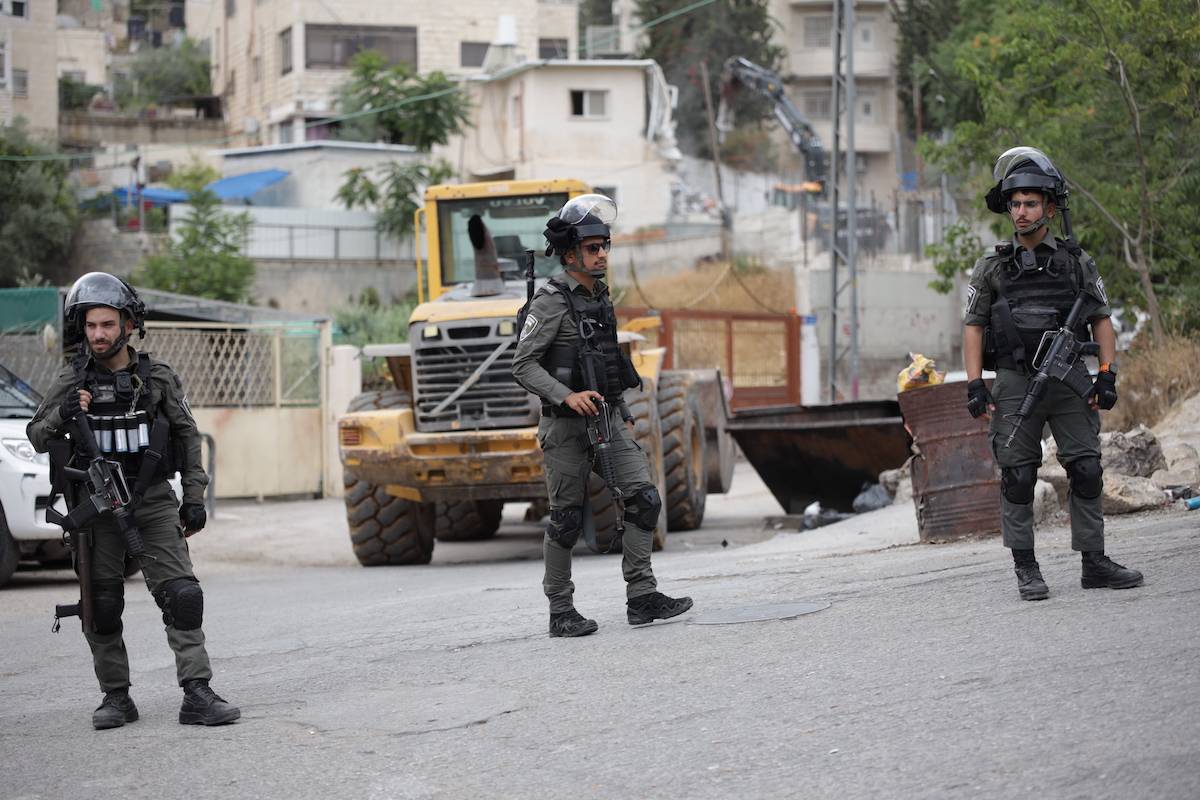 Israeli forces demolished the house of Palestinian Wafi al-Tavil with bulldozers in the Silvan neighborhood of East Jerusalem, allegedly for being unauthorized, in Jerusalem on June 20, 2023 [Saeed Qaq - Anadolu Agency]