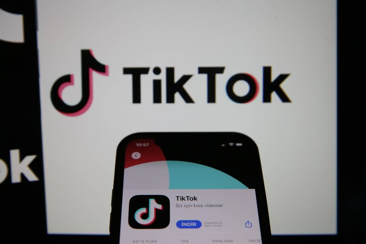 In this photo illustration, logos of “TikTok” are displayed on mobile phone screen and computer screen in Ankara, Turkiye on June 30, 2023 [Cem Genco - Anadolu Agency]
