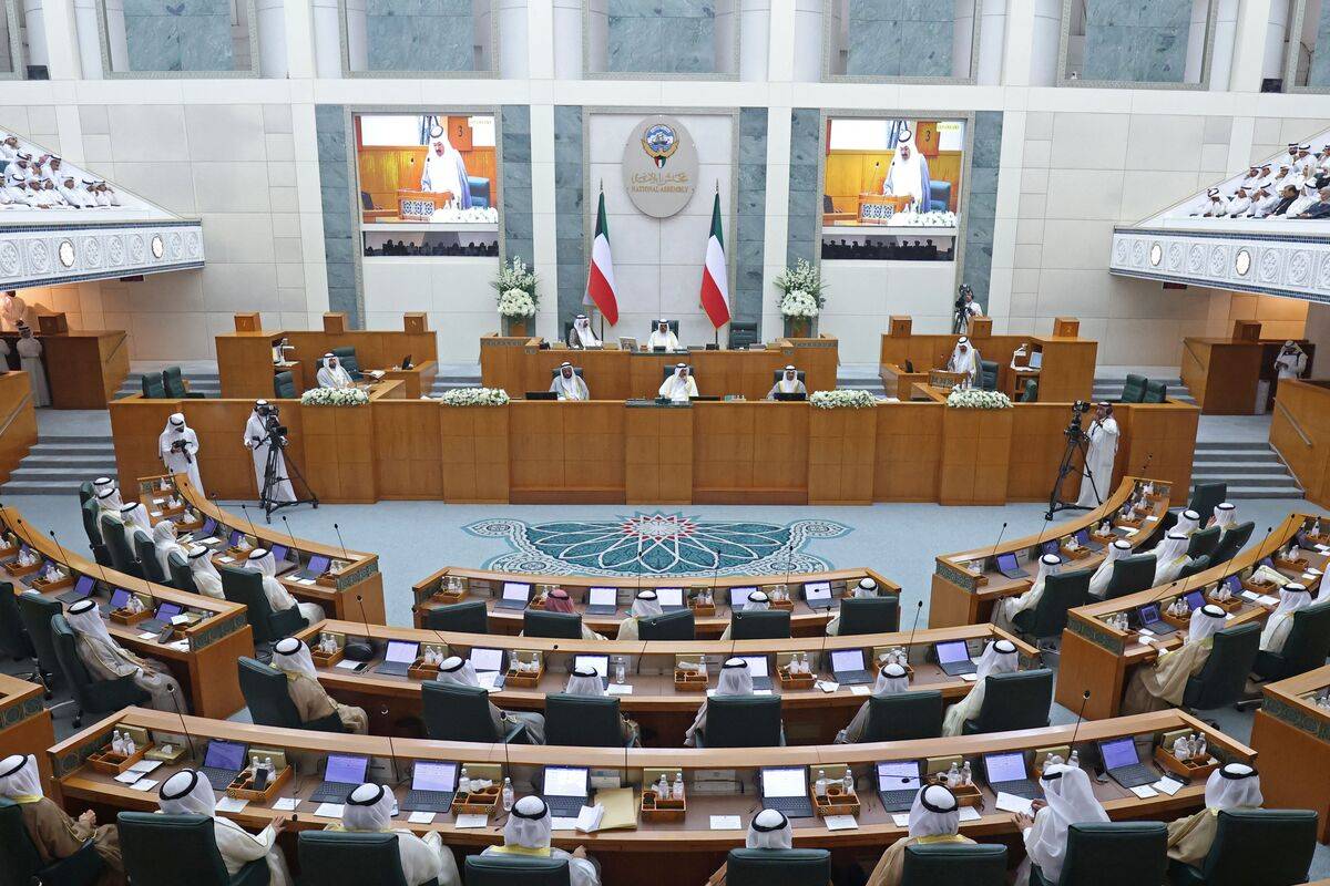 Kuwaiti members of palriament attend the opening ceremony of the 17th parliamentary term at the National Assembly in Kuwait City on June 20, 2023. [Photo by YASSER AL-ZAYYAT/AFP via Getty Images]