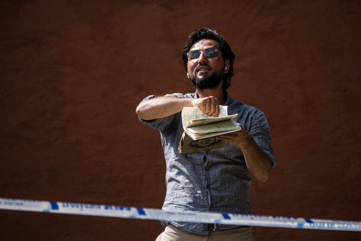 Salwan Momika protests outside a mosque in Stockholm on June 28, 2023, during the Eid al-Adha holiday. Momika, 37, who fled from Iraq to Sweden several years ago, was granted permission by the Swedish police to burn the Muslim holy book during the demonstration [JONATHAN NACKSTRAND/AFP via Getty Images]