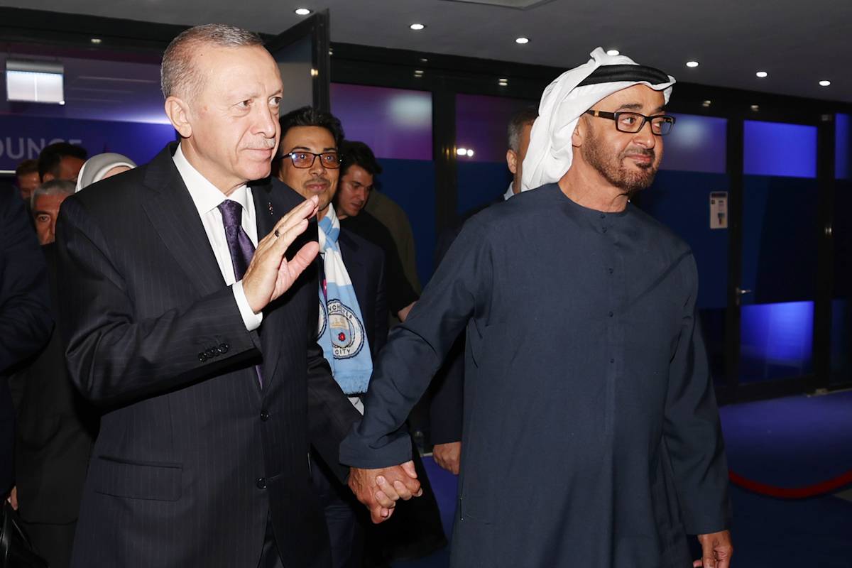 Turkiye’s Erdogan and UAE leader MBZ hold hands after meal