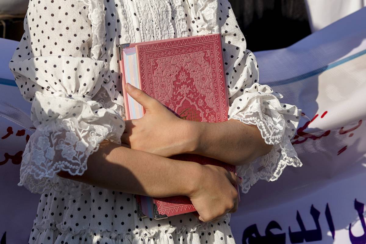 Muslims gather to protest the burning of the Holy Quran by an extremist in Stockholm, in Najaf, Iraq on July 02, 2023 [Karrar Essa/Anadolu Agency]